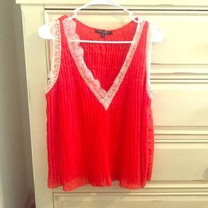 red flowy tank